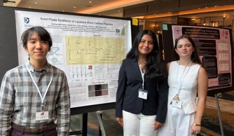 SAC students with research poster